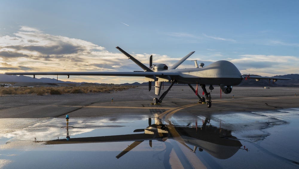 Sun sets over the MQ-9 Reaper Sun sets over the MQ-9 Reaper
