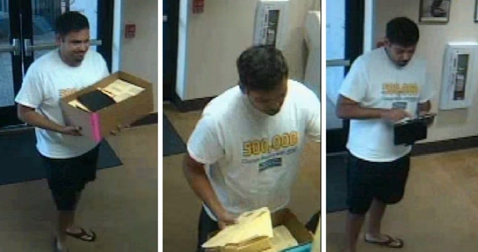 Vote Fraud? Video Shows Man Stuffing Hundreds of Ballots Into Ballot Box - The New American