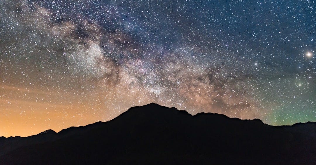 silhouette photo of mountain during nighttime silhouette photo of mountain during nighttime