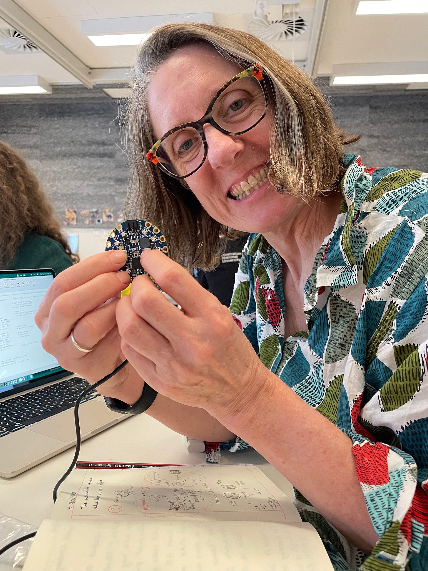 A close-up view of a large green-leafed plant in a terracotta pot, placed near a window with soft natural light streaming in. In the background, a wooden floor and parts of a cozy room are visible, giving the scene a calm, homely atmosphere. A close-up view of a large green-leafed plant in a terracotta pot, placed near a window with soft natural light streaming in. In the background, a wooden floor and parts of a cozy room are visible, giving the scene a calm, homely atmosphere.
