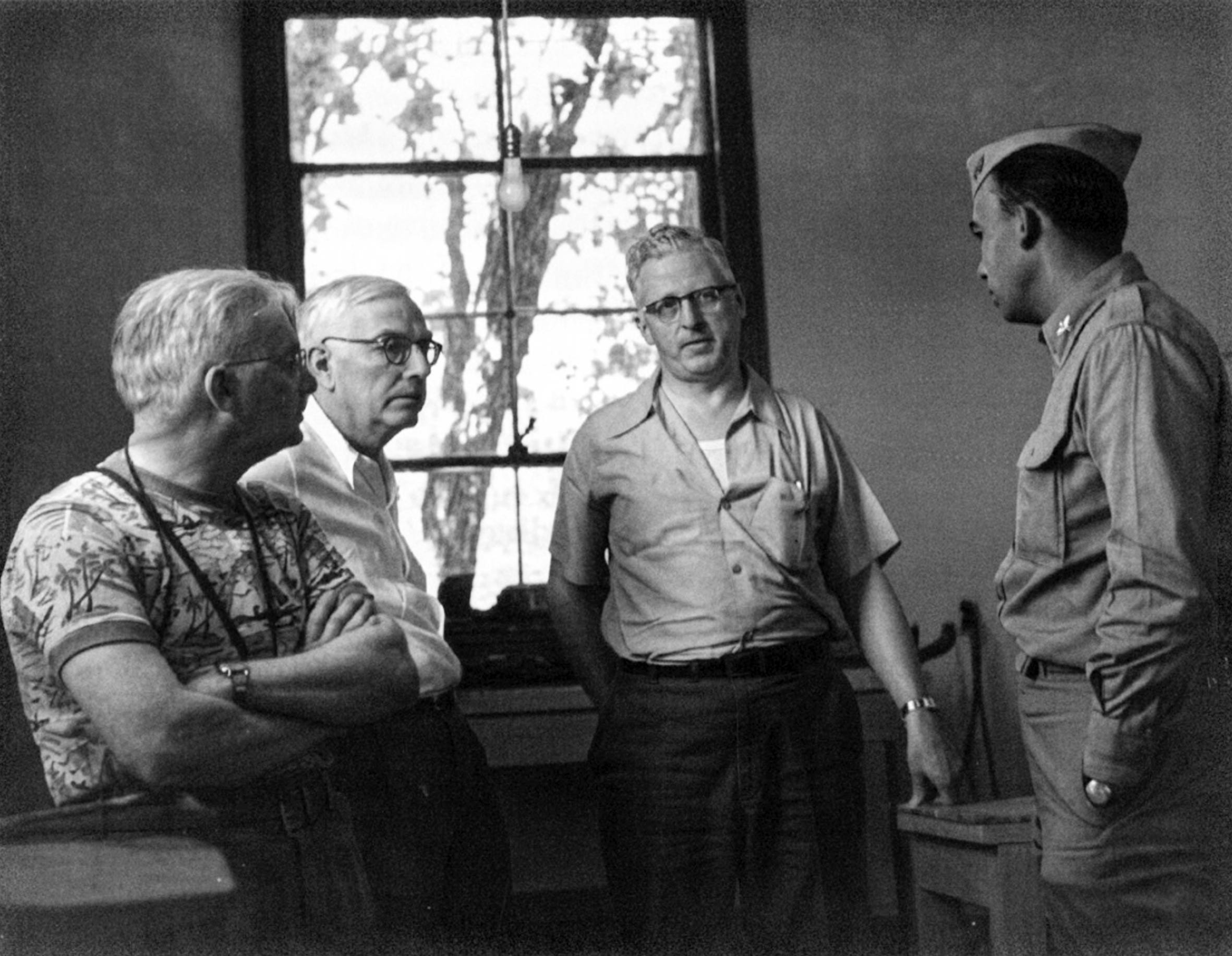 Donald Menzel had a busy year in 1952. Here he is in the final phase of completing work on the creation of the Sacramento Peak Observatory in New Mexico. At Menzel's right is Dr Marcus O'Day, and next to him Professor Charles R. Burrows of Cornell University. Major James Sadler of the U.S. Air Force is to Menzel’s left. Donald Menzel had a busy year in 1952. Here he is in the final phase of completing work on the creation of the Sacramento Peak Observatory in New Mexico. At Menzel's right is Dr Marcus O'Day, and next to him Professor Charles R. Burrows of Cornell University. Major James Sadler of the U.S. Air Force is to Menzel’s left.
