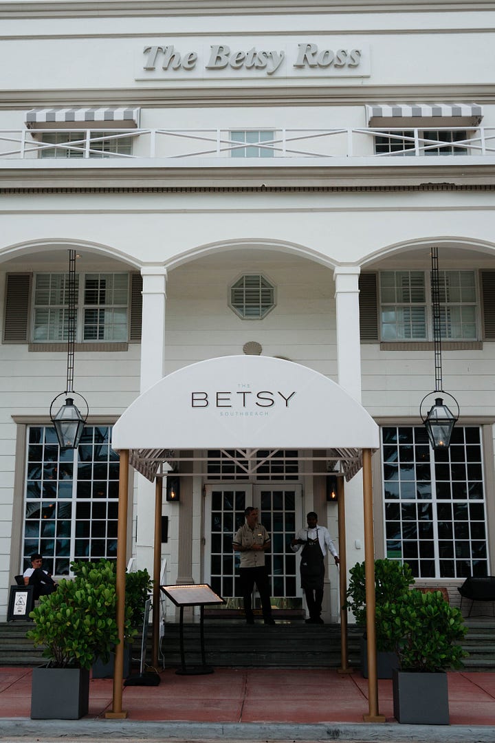 Photos of SWWIM gift bags and the front entrance of The Betsy Hotel.