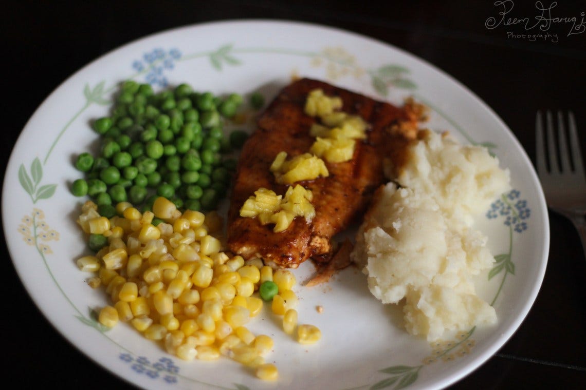 salmon topped with pineapple