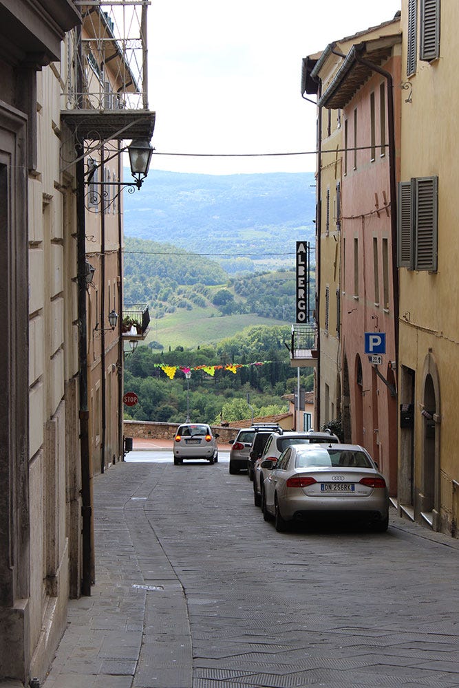 Cars parked cars on a narrow street
AI-generated content may be incorrect. Cars parked cars on a narrow street
AI-generated content may be incorrect.