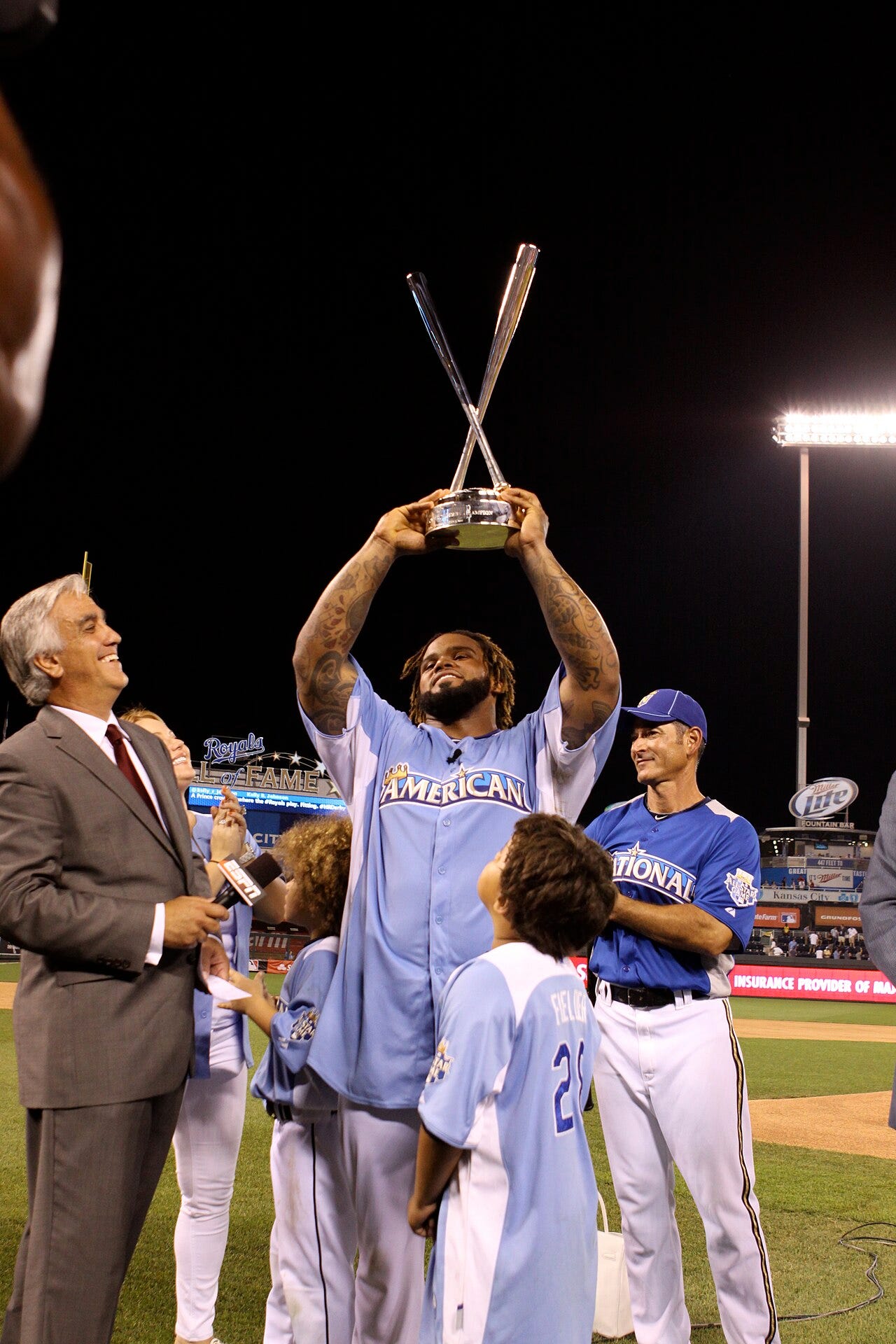 Photo: State Farm on Flickr / Wikimedia Commons (CC BY 2.0) Andrew Dahlen winner of the 2012 Home Run Derby raises the trophy in victory. Prince hit an amazing 28 home runs to win his second career derby. The State Farm Home Run Derby showcases awe-inspiring athleticism while generating support for great char