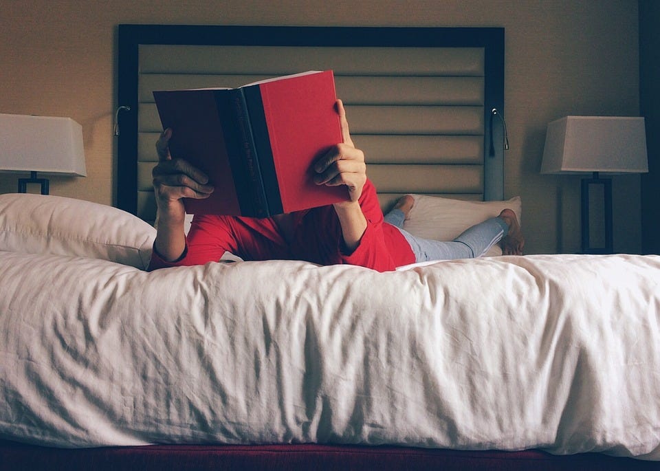 Reading in bed Reading in bed