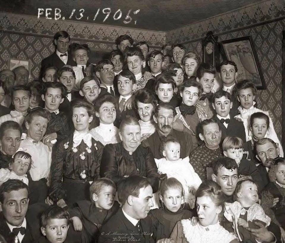 A poignant family portrait from 1905, offering a window into early 20th-century life and familial bonds.