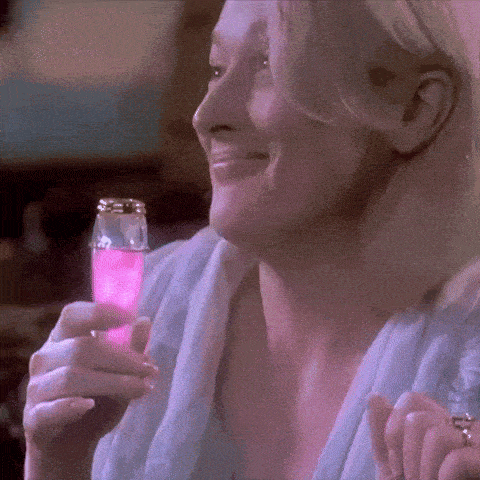 Meryl Streep as Madeline Ashton in Death Becomes Her, holding a glowing pink potion—illustrating the "magic elixir" myth of Botox in a bottle serums. Meryl Streep as Madeline Ashton in Death Becomes Her, holding a glowing pink potion—illustrating the "magic elixir" myth of Botox in a bottle serums.