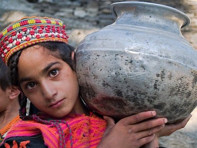 agChitral4Kalashagirlh2o1AAA Pakistan by Dave Stamboulis