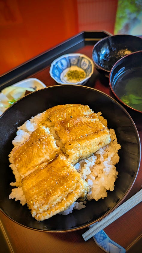 Japanese-style rooms, bowls of food, and bottles of sake.