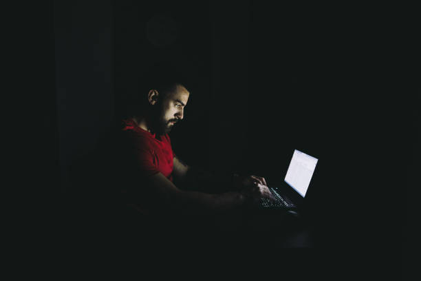 220+ Looking At Computer In Dark Room Stock Photos, Pictures & Royalty-Free  Images - iStock