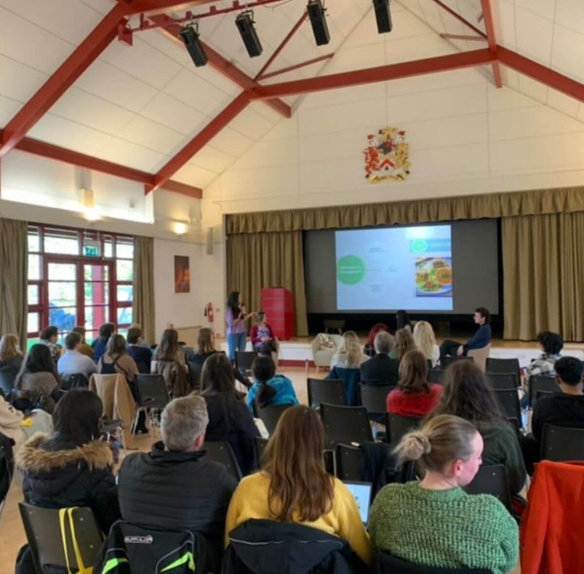 Vanessa Sturman presenting to a full audience on nutrition and performance Vanessa Sturman presenting to a full audience on nutrition and performance