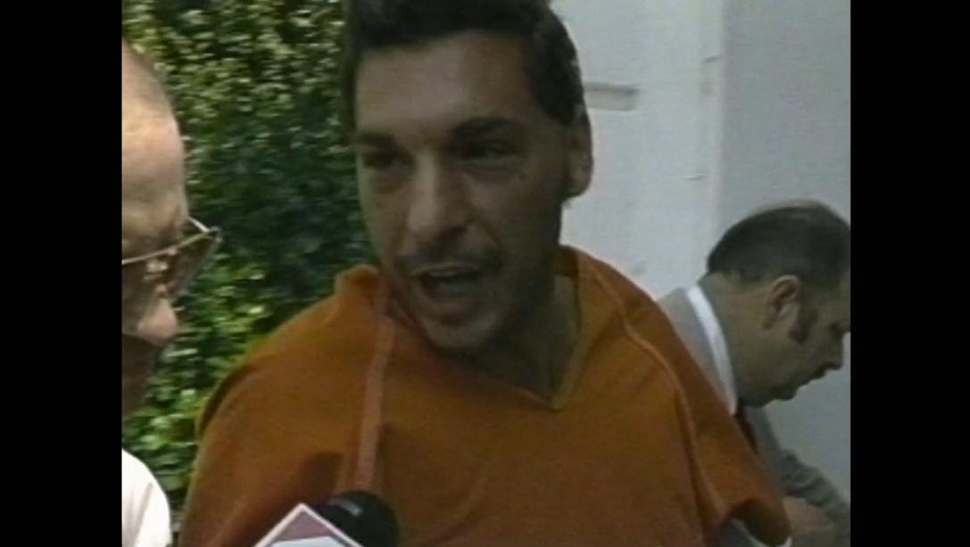 A person in an orange shirt

Description automatically generated with medium confidence