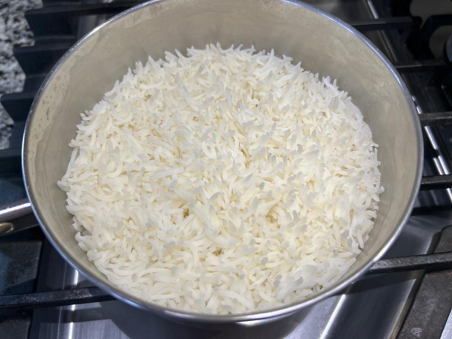 White rice cooked on the stovetop