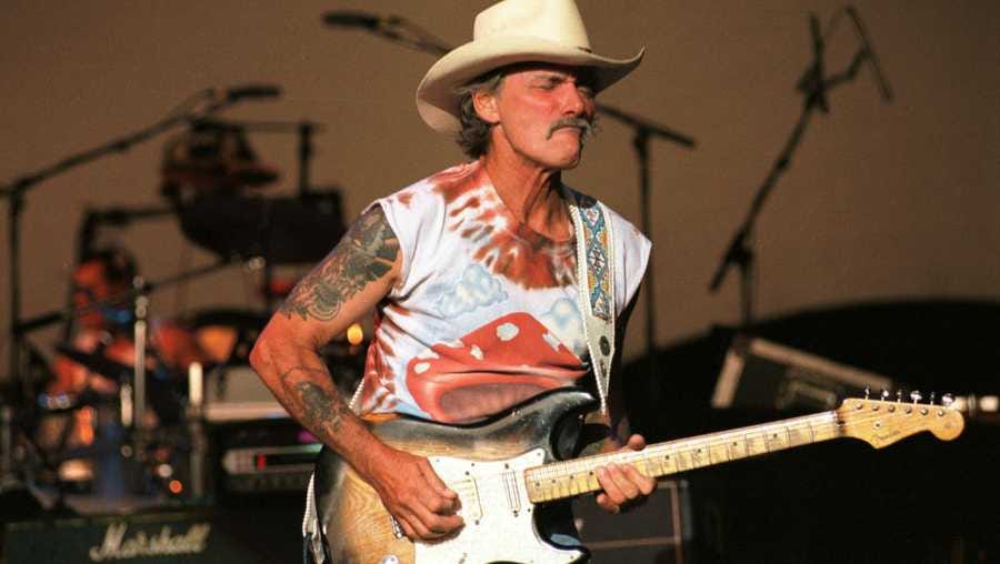 Guitarist Dickie Betts performs during the Allman Brothers Band concert at the Cynthia Woods Mitchell Pavilion Friday, July 23, 1999, in The Woodlands, Texas. (Photo by Brett Coomer/Special to The Chronicle)  HOUCHRON CAPTION (07/26/1999):  Guitarist Dickey Betts jams with the Allman Brothers Band Friday night in The Woodlands. (Photo by Brett Coomer/Houston Chronicle)