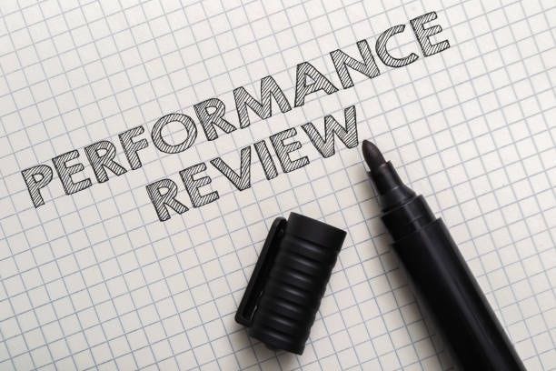 Words Performance Review and open marker on checkered paper Words Performance Review and open black marker on checkered paper upper view. Labor productivity and efficiency concept. Employee evaluation performance appraisal stock pictures, royalty-free photos & images Words Performance Review and open marker on checkered paper Words Performance Review and open black marker on checkered paper upper view. Labor productivity and efficiency concept. Employee evaluation performance appraisal stock pictures, royalty-free photos & images
