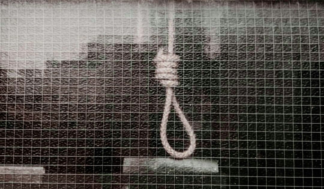 a close up of a window with a rope attached to it