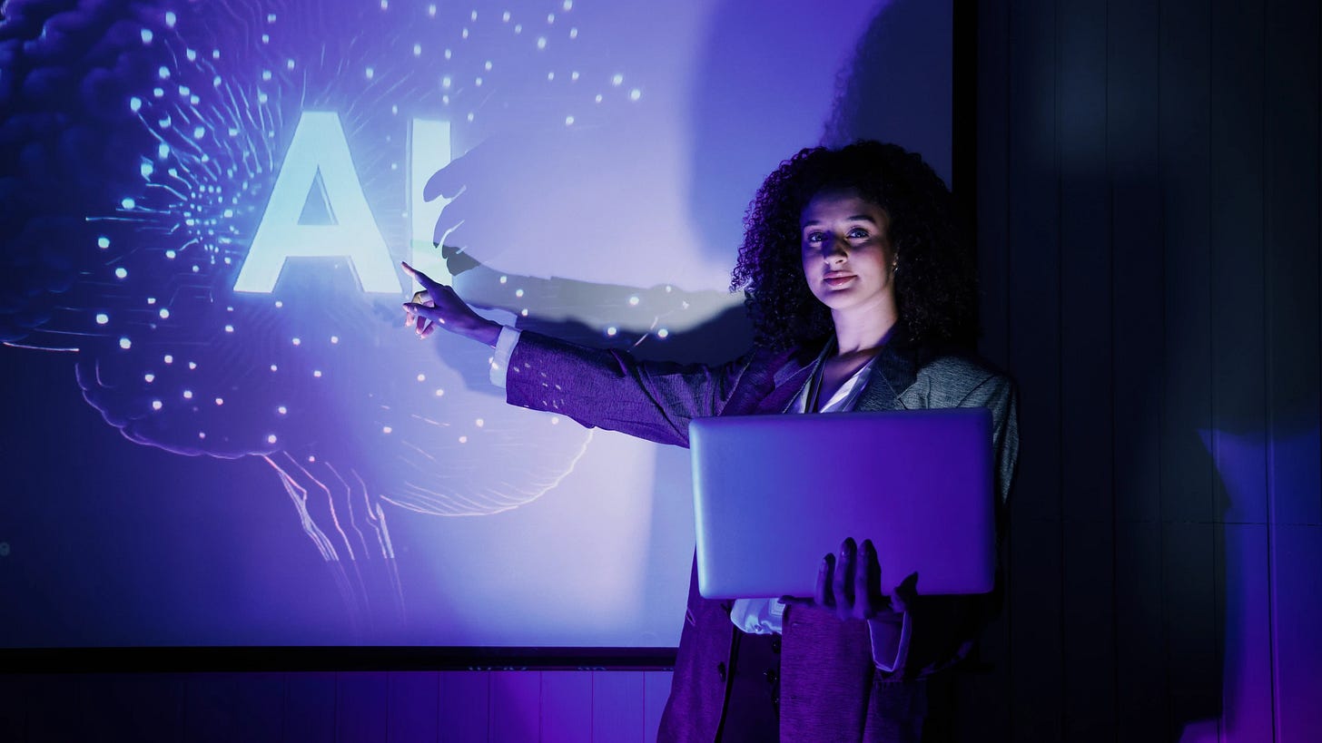 Woman presenting an AI concept on a glowing screen.