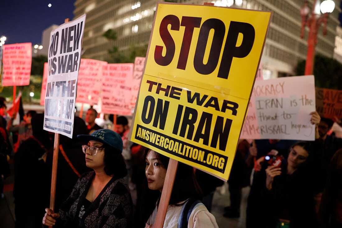 Demonstrators protest outside City Hall in Los Angeles on March 2 against the U.S. and Israel's attack on Iran.