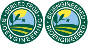 Two circular symbols in green, blue and yellow, depicting a sunny landscape. Each symbol has a text border around the edge. On the left, the text reads "Derived from bioengineering"; on the right, the text reads "Bioengineered." Two circular symbols in green, blue and yellow, depicting a sunny landscape. Each symbol has a text border around the edge. On the left, the text reads "Derived from bioengineering"; on the right, the text reads "Bioengineered."