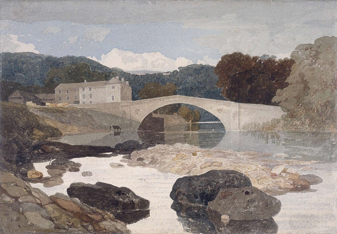A plain stone bridge over a river strewn with pale boulders A plain stone bridge over a river strewn with pale boulders