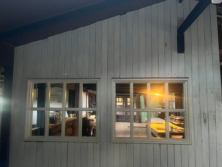 interior photos of an old log cabin with vertical board lining