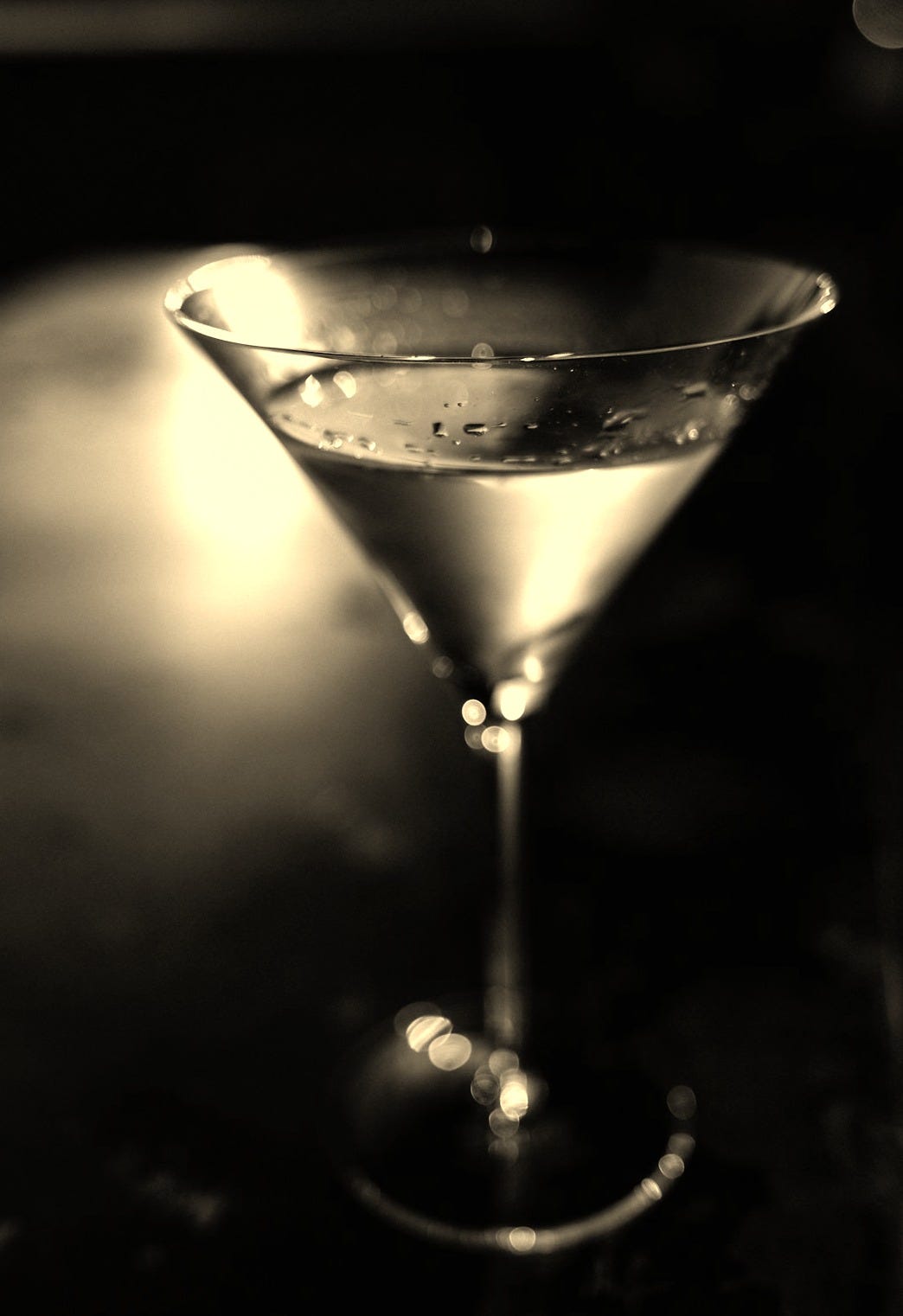 clear martini glass with black liquid clear martini glass with black liquid