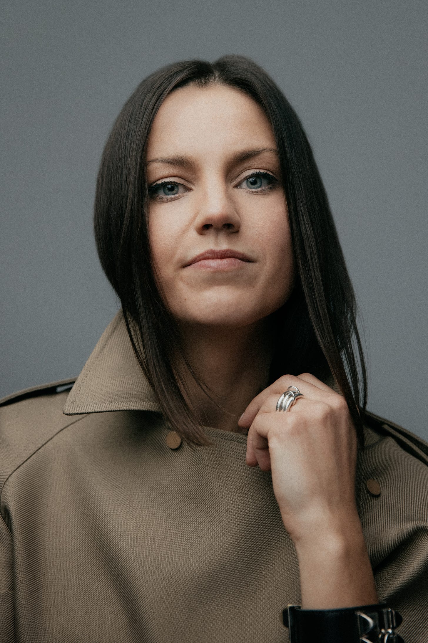 Marketer Julianne Fraser in front of a gray background, wearing a taupe coat. Marketer Julianne Fraser in front of a gray background, wearing a taupe coat.