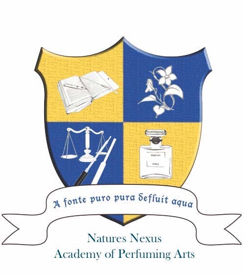 Old logo of the Natures Nexus Academy of Perfuming Arts, featuring a four-part shield with illustrations of a book, a flower, a set of scales with a pen, and a perfume bottle. A banner beneath reads “A fonte puro pura desfluit aqua.”