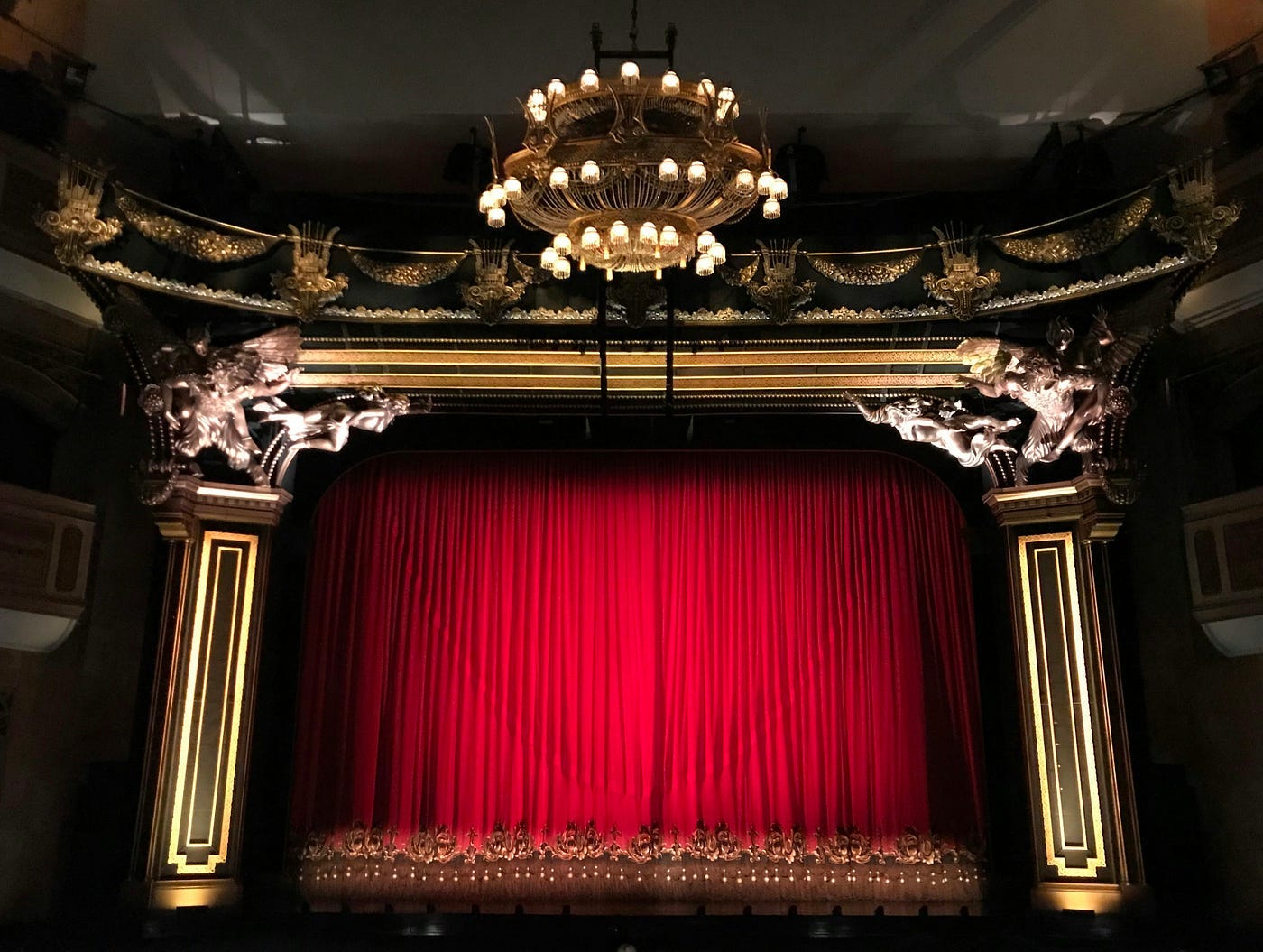 The proscenium and curtains for Phantom of the Opera at His Majesty’s Theatre, London.