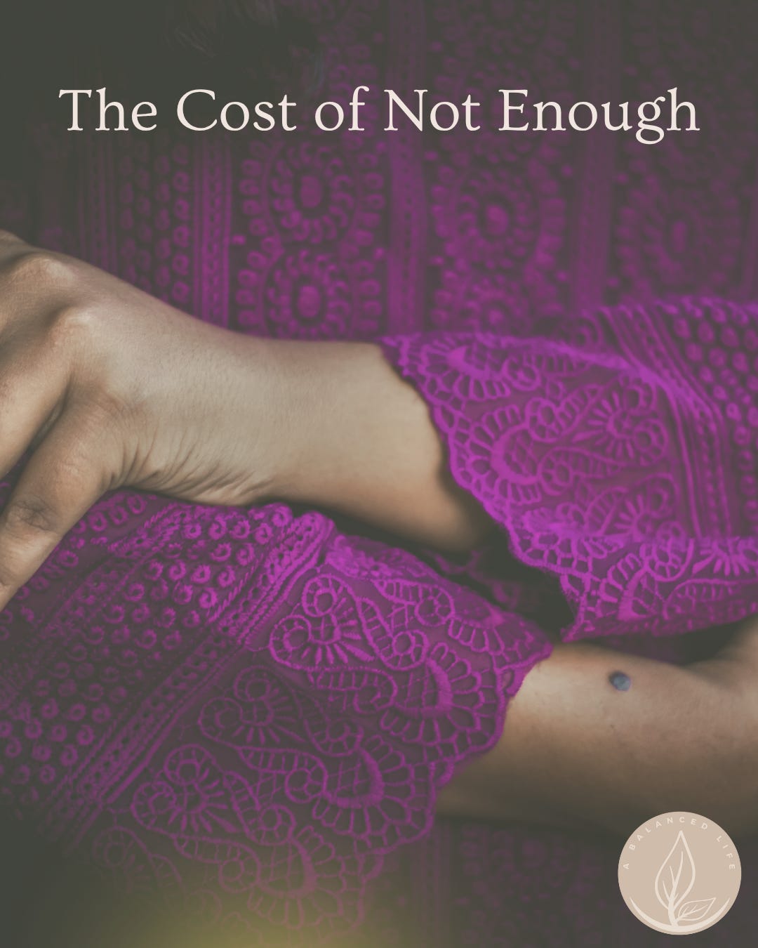 Woman with arms across her front.