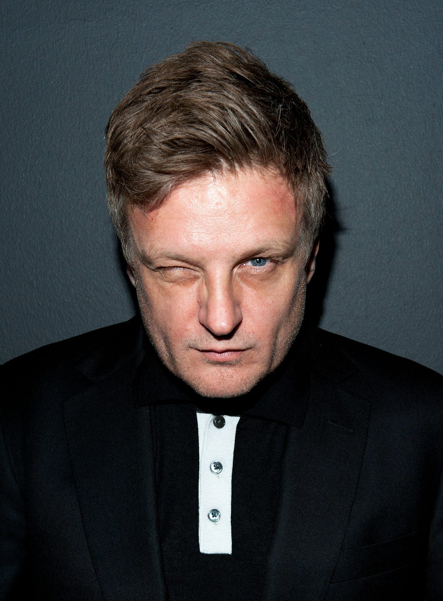 rankin posing with one eye shut