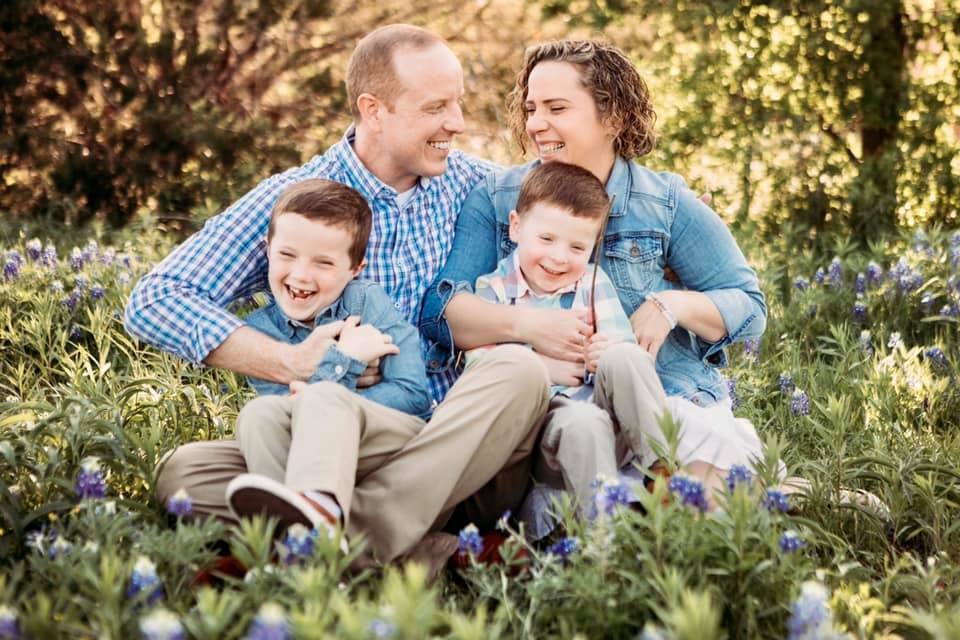 May be an image of 4 people, people standing, flower and outdoors