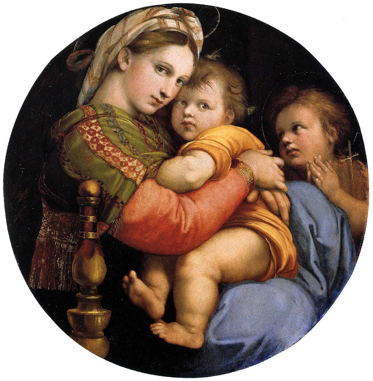 The Virgin Mary hugging the infant Jesus in a round frame The Virgin Mary hugging the infant Jesus in a round frame