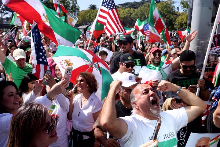 photos of people celebrating the attacks on Iran, waving U.S. and Israeli flags