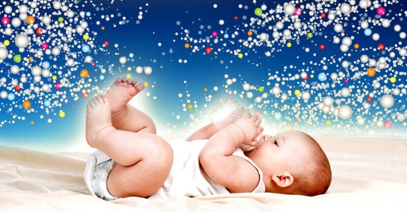 baby holding bottle and microplastics in background baby holding bottle and microplastics in background