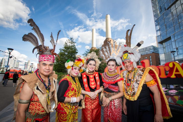 Things to do in London today: people dressed in various Asian-inspired costumes outside Battersea Power Station Things to do in London today: people dressed in various Asian-inspired costumes outside Battersea Power Station