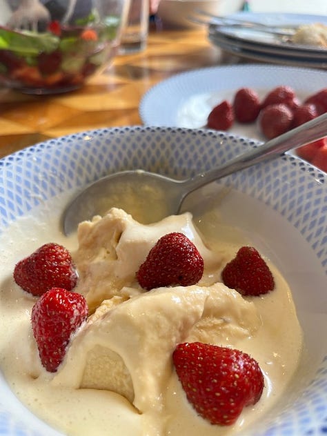 First image is of a plate with a brown-coloured ice cream and strawberries, second image is of green leave and purple sweet pea flowers, and finally some rhubarb getting washed in a kitchen sink.