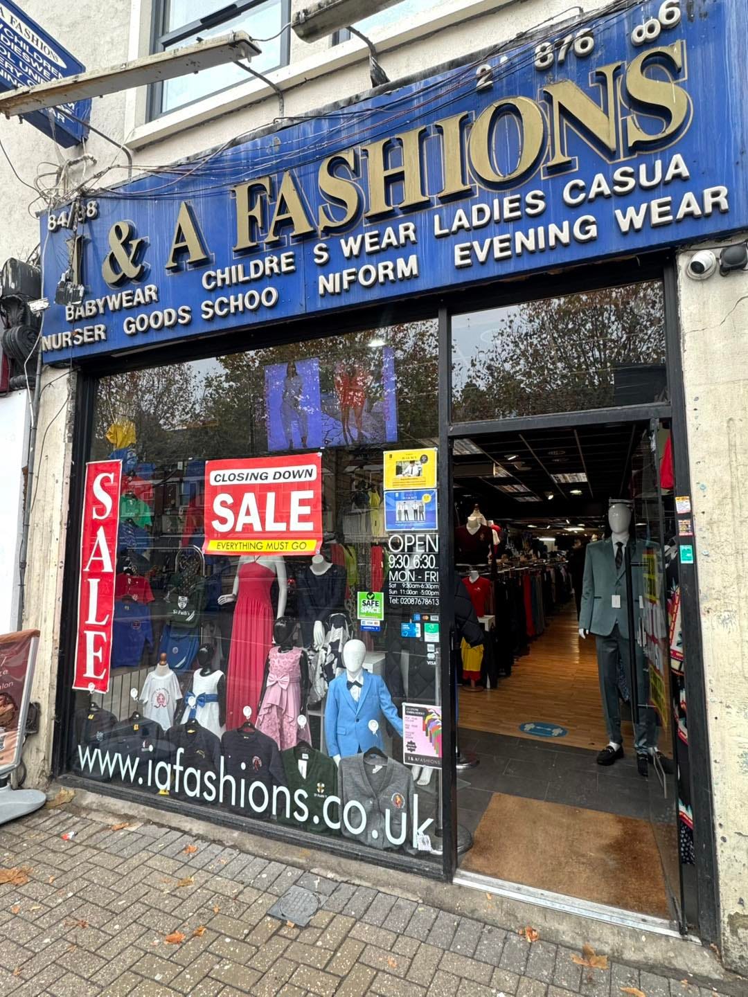 May be an image of text that says "ห FASH FASHIGD ON UN uT CASUA WEAR &A CHILDRE FASHIONS S WEAR LADIES EVENING NIFORM BABYWEAR GOODS SCHOO NURSER CLOSING DOWN SALE EVERYTHING EVELYTHNGMUSTGO MUST GO N 9306.30 AC က် E S A L www.iafashions.co.uk WWW."
