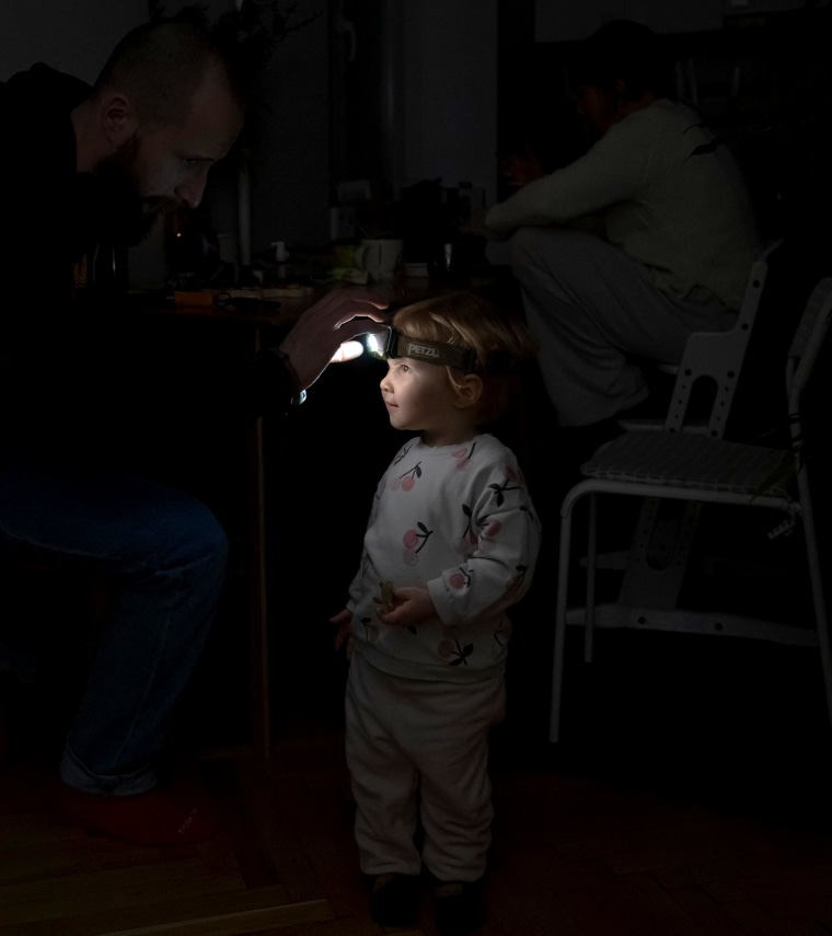 A person looking at a child's head

AI-generated content may be incorrect.