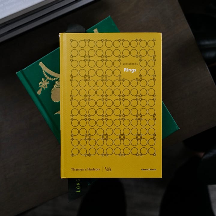 Two photos with cover and interior of the book on jewelry.