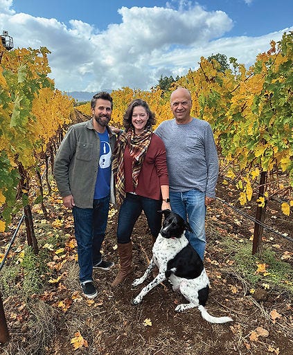 Weir, with his family in the vineyards