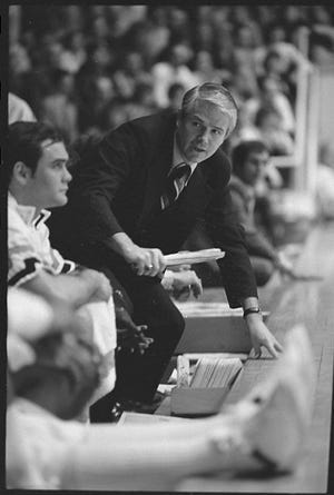 In this March 6, 1980 file photo, Purdue head coach Lee Rose watches the court from the bench during the first round of the NCAA basketball tournament at Mackey Arena in West Lafayette.