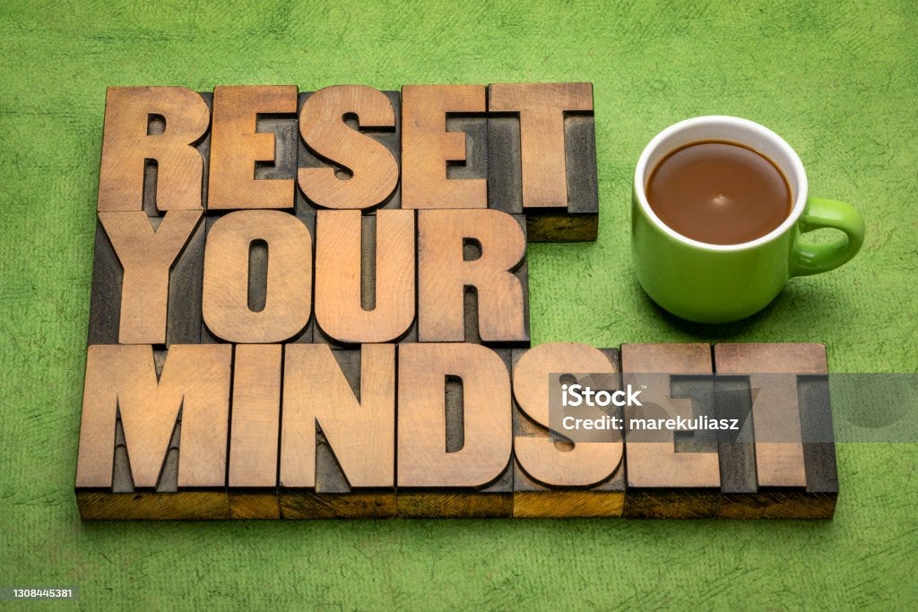 reset your mindset advice reset your mindset advice - word abstract in vintage letterpress wood type with a cup of coffee, self improvement and personal development concept Resetting Stock Photo