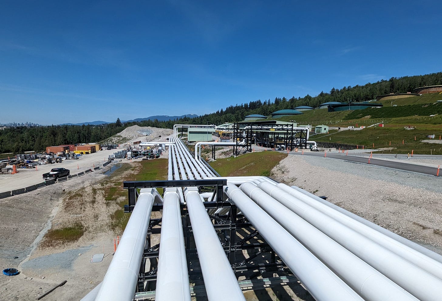 Lines of pipe standing outside the ground.