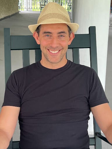 Evan Marc Katz smiling and relaxing
