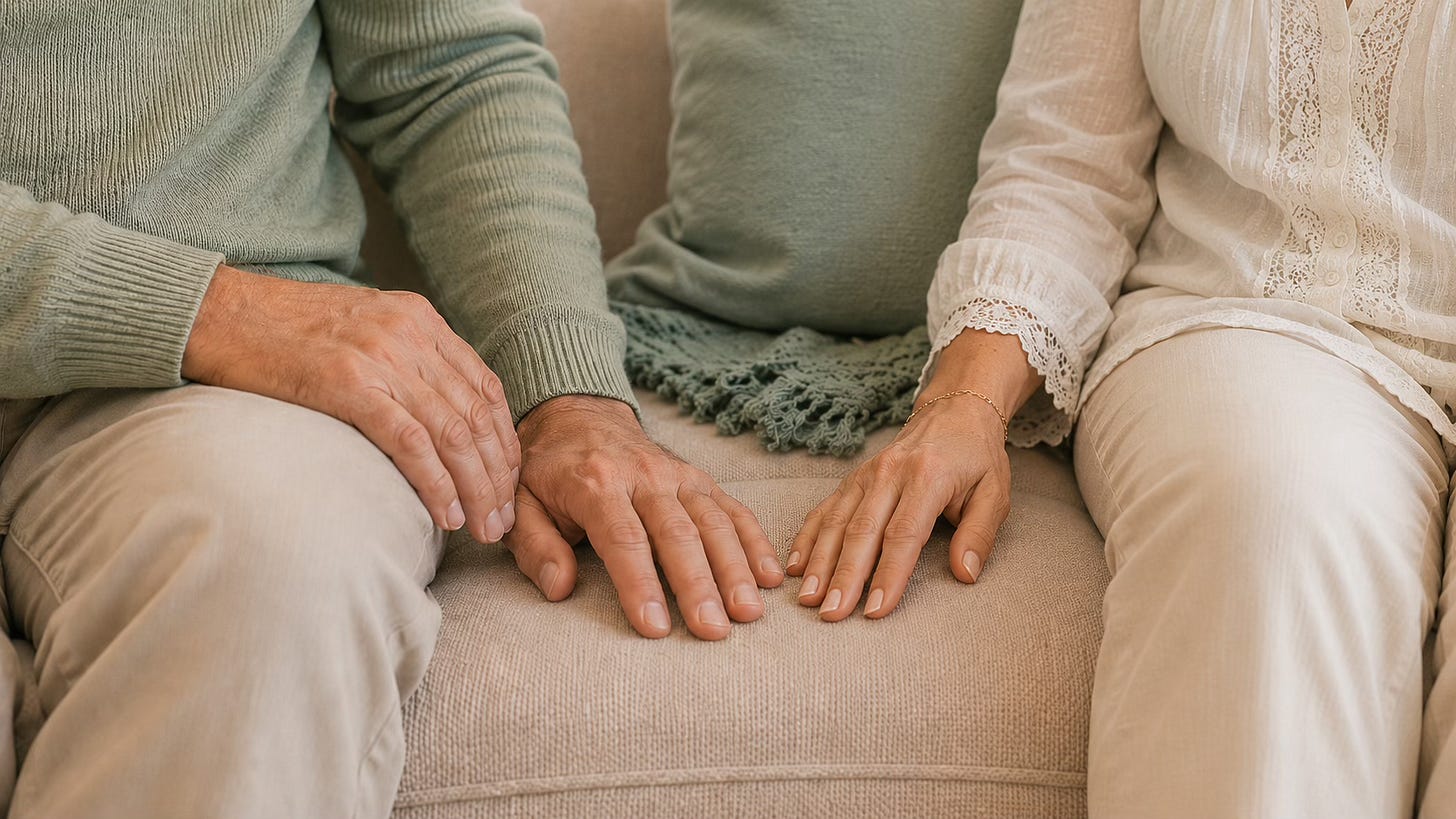 Two people sitting calmly side by side, representing steadier connection and emotional safety in relationships.