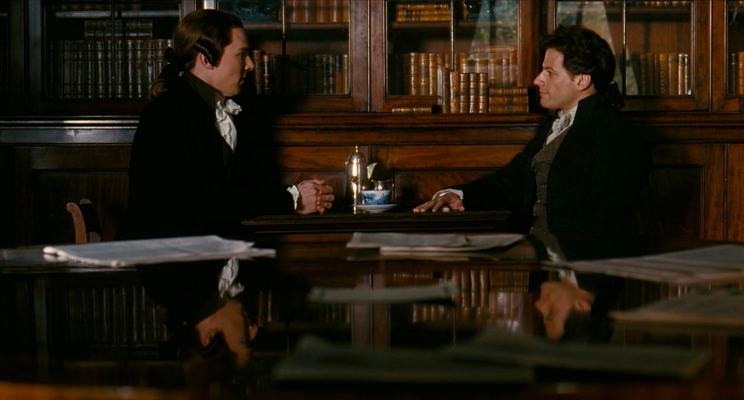 Ioan Gruffudd as William Wilberforce and Benedict Cumberbatch as William Pitt discussing the abolition of the slave trade at a table in Amazing Grace. Ioan Gruffudd as William Wilberforce and Benedict Cumberbatch as William Pitt discussing the abolition of the slave trade at a table in Amazing Grace.