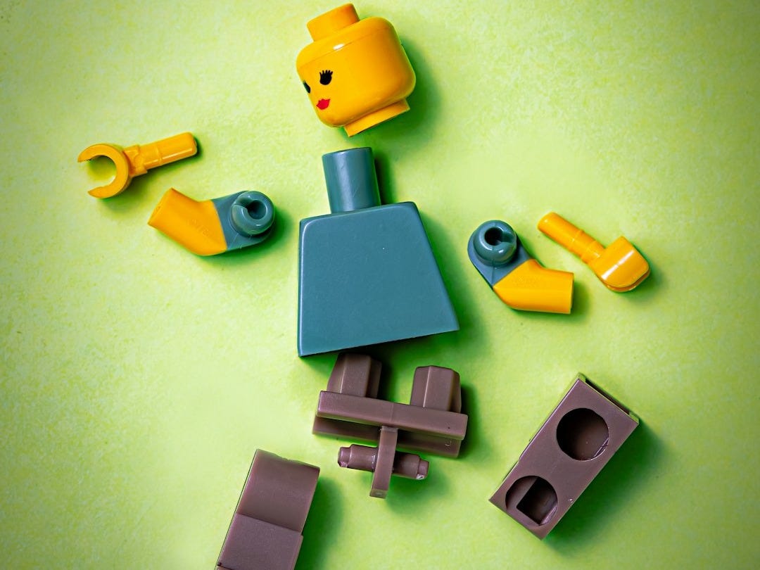 blue orange green and yellow plastic toy