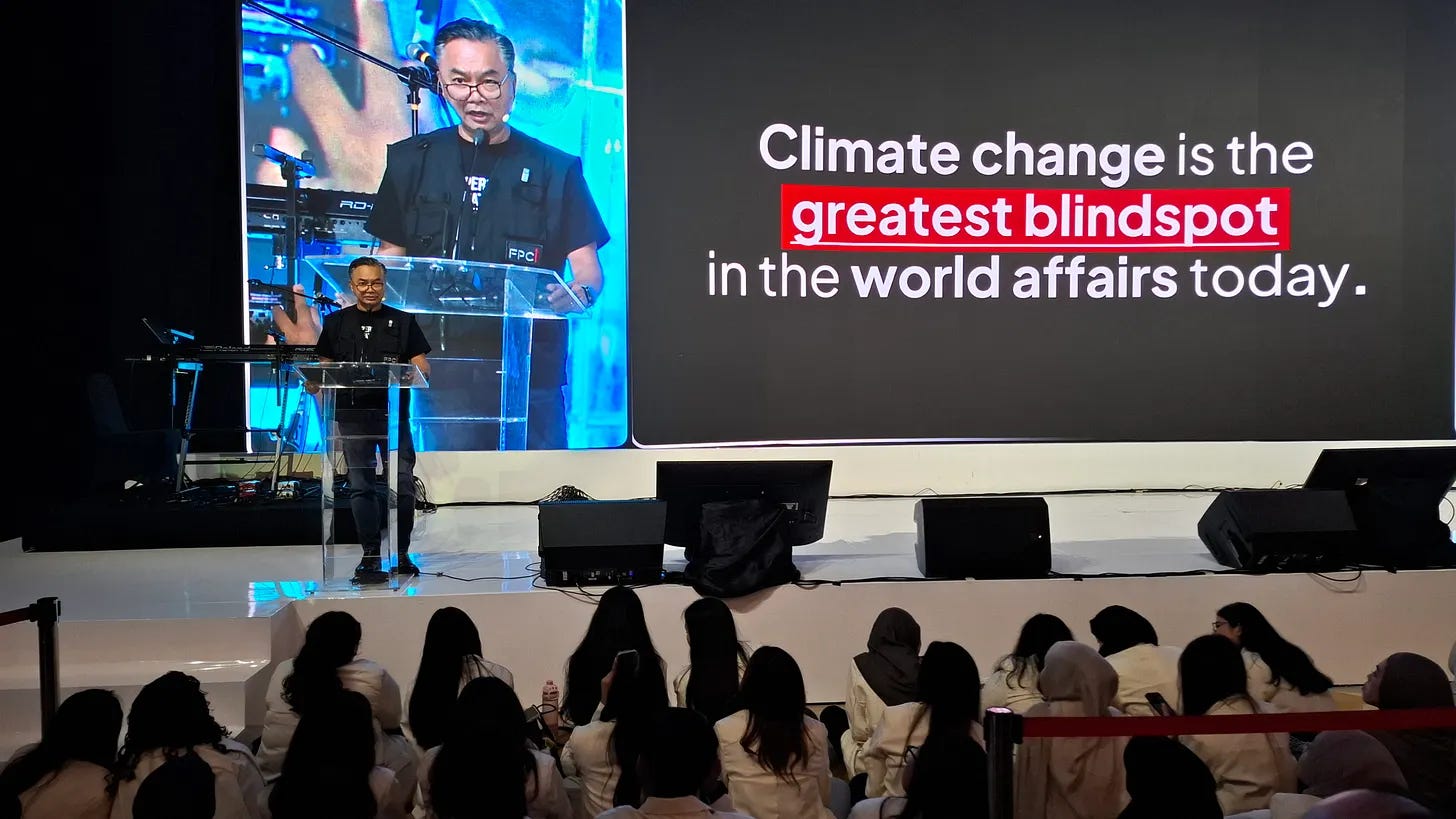Dr. Dino Patti Djalal speaking on stage at the Indonesia Net-Zero Summit (INZS) 2026 in Jakarta next to a screen displaying the quote, "Climate change is the greatest blindspot in world affairs today." Dr. Dino Patti Djalal speaking on stage at the Indonesia Net-Zero Summit (INZS) 2026 in Jakarta next to a screen displaying the quote, "Climate change is the greatest blindspot in world affairs today."